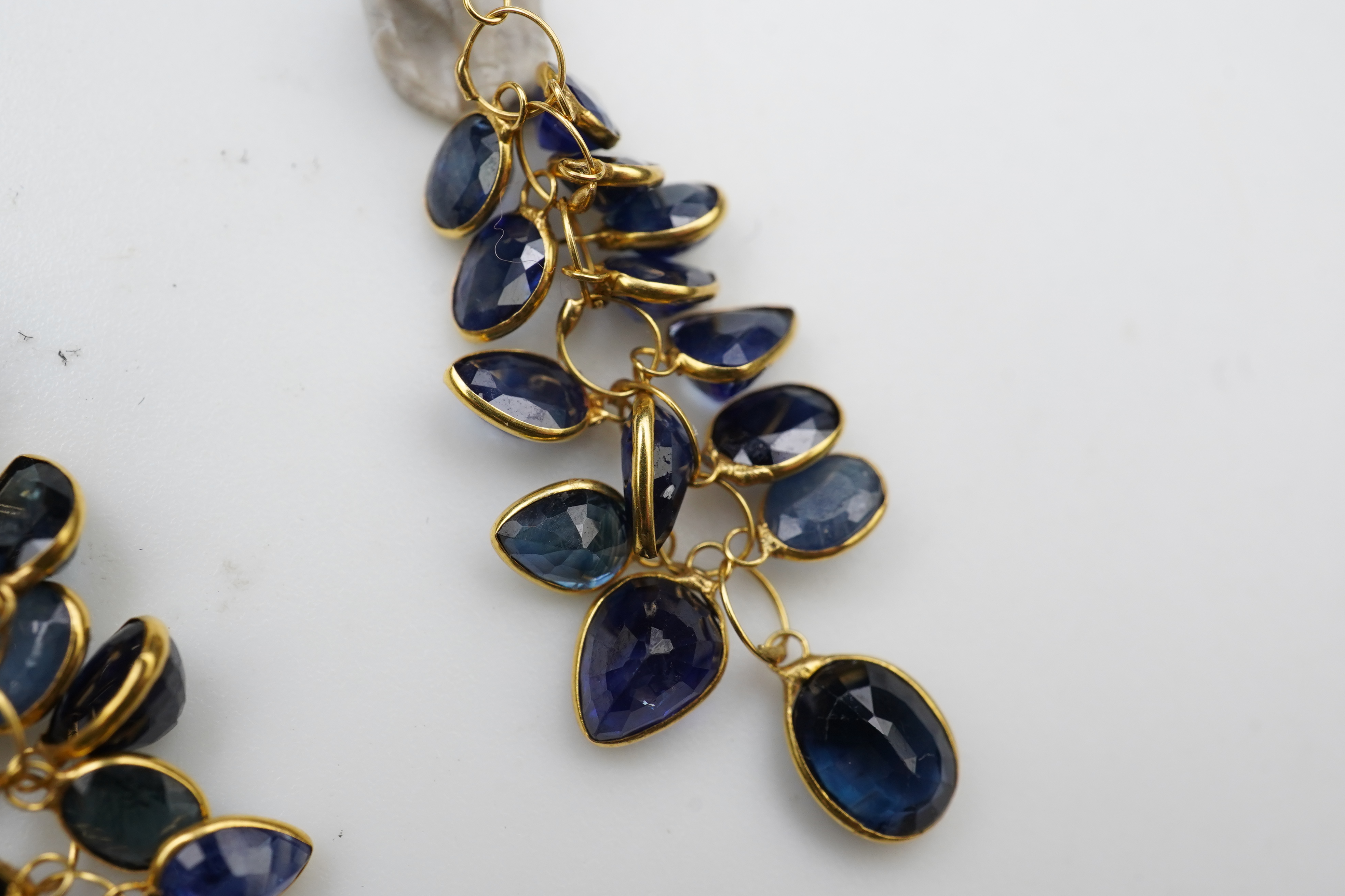 A pair of sapphire pendent earrings